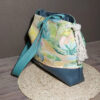 sac seau bucket oasis corail et pétrole avec bandoulière profil