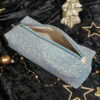 trousse alice pailletée vert ouverte bureau maquillage féminine élégante chic raffinée