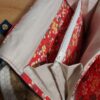 portefeuille complice birman portemonnaie détails bleu et rouge multifonction compagnon pratique au quotidien