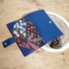 portefeuille complice birman rabat ouvert bleu et rouge multifonction compagnon pratique au quotidien