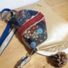 sac anesa birman couché petit format fermé par rabat avec poches intérieures.