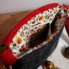 sac anesa Red-Léo ouvert petit format fermé par rabat avec poche intérieure.